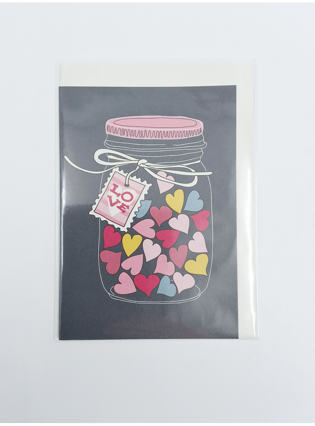 bocal à cartes de vœux avec des cœurs