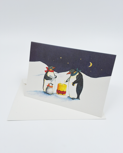 Penguin candle greeting card