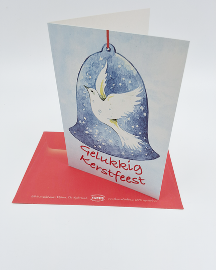 Greeting card dove in Christmas bell "Merry Christmas"